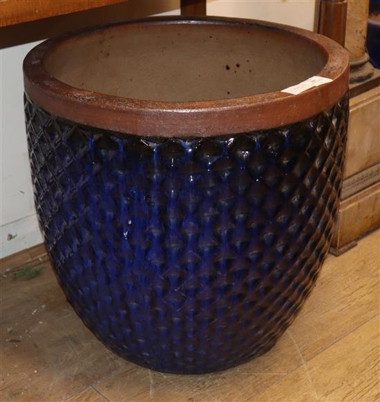 A blue glazed moulded body garden planter Diam.50cm
